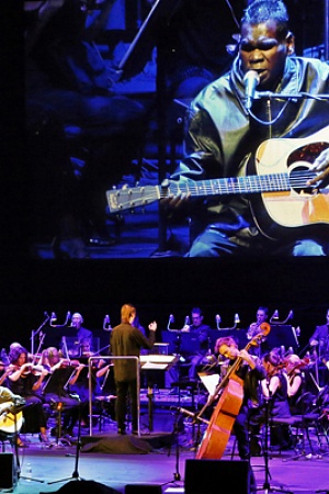 Gurrumul performs with the Sydney Symphony Orchestra as part of Vivid 2013 (photograph by Prudence Upton)